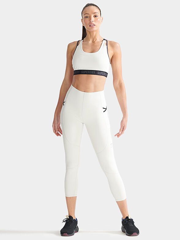 Sports leggings in pale grey color - 2