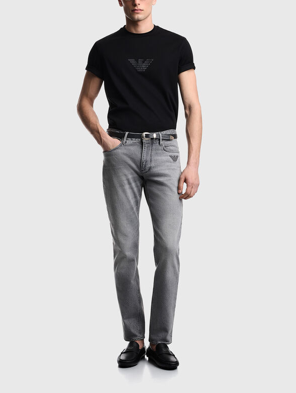 Jeans with a bleached effect and embroidered logo - 4