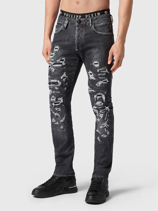 Slim jeans with ripped accents