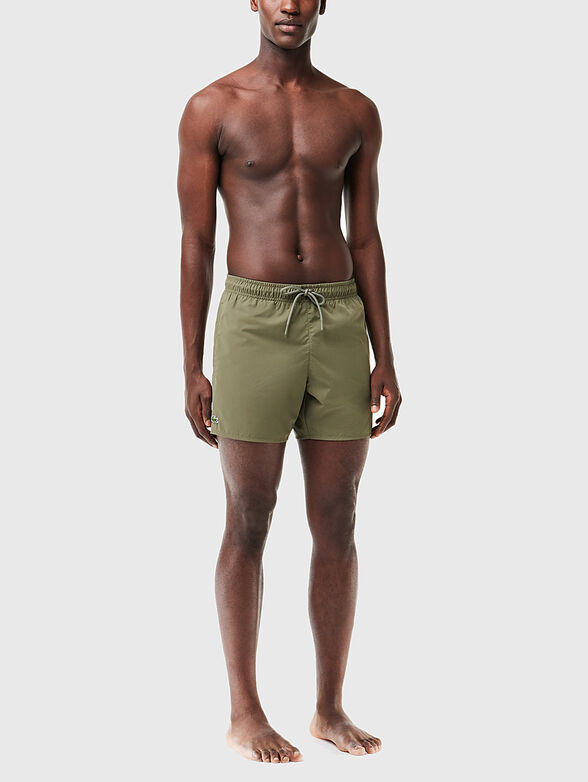 Yellow shorts with logo detail - 1