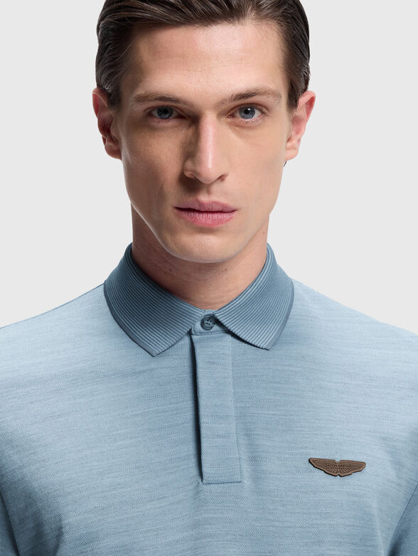 Blue polo shirt with logo - 1