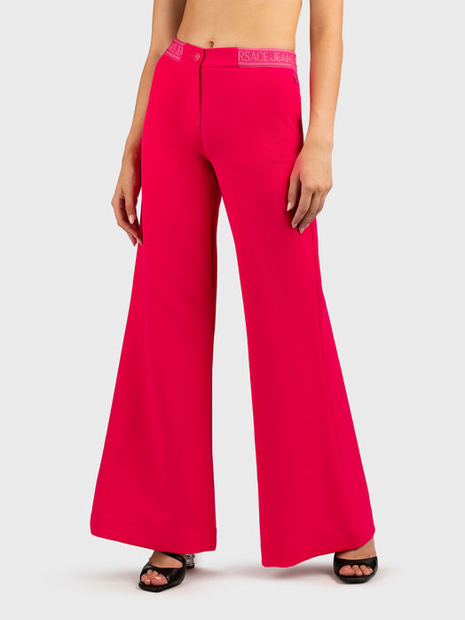 Trousers with logo accent on the waist 