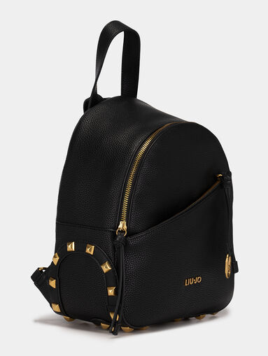 Black backpack with golden accents - 3