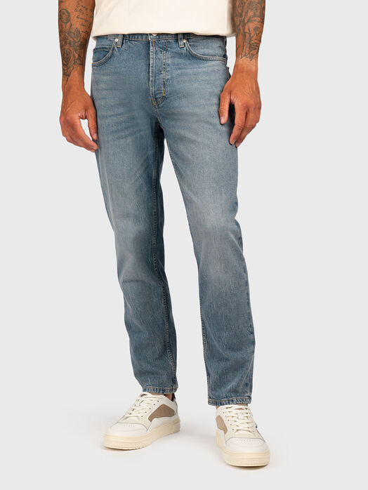 Jeans with washed effect and logo