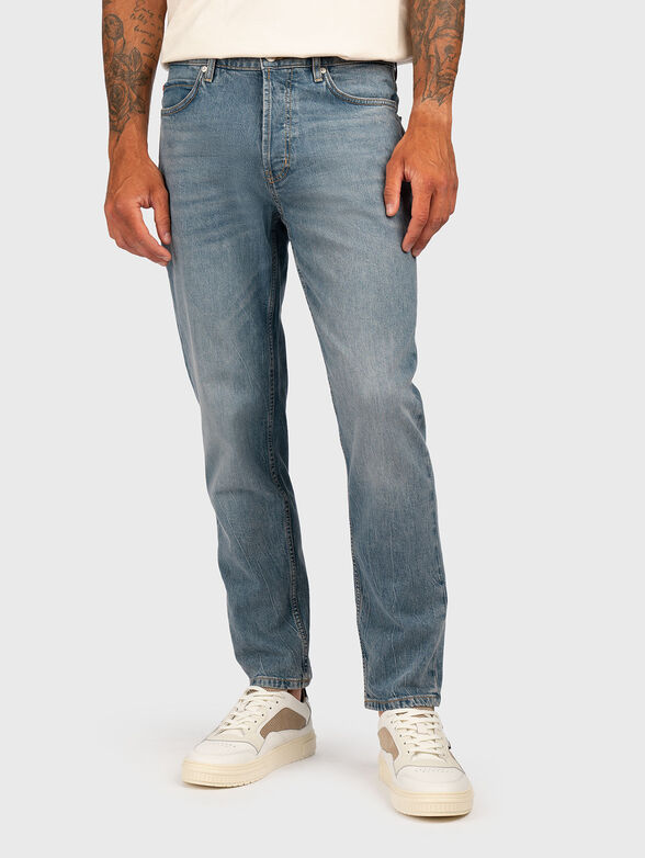 Jeans with washed effect and logo - 1