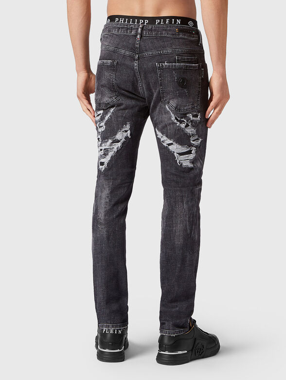 Slim jeans with ripped accents - 2
