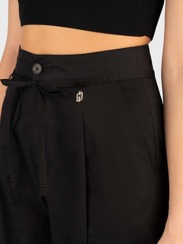Cotton trousers with wide legs in black - 3