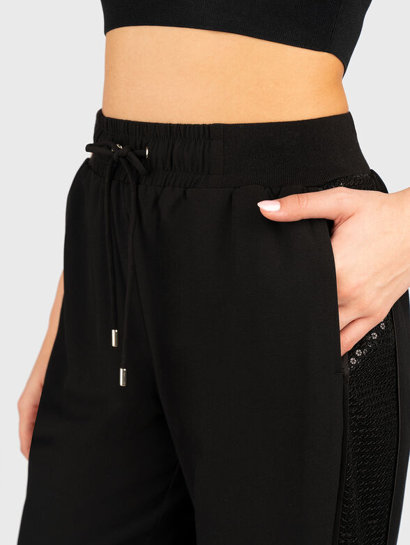 Sports trousers with sequins and logo - 4