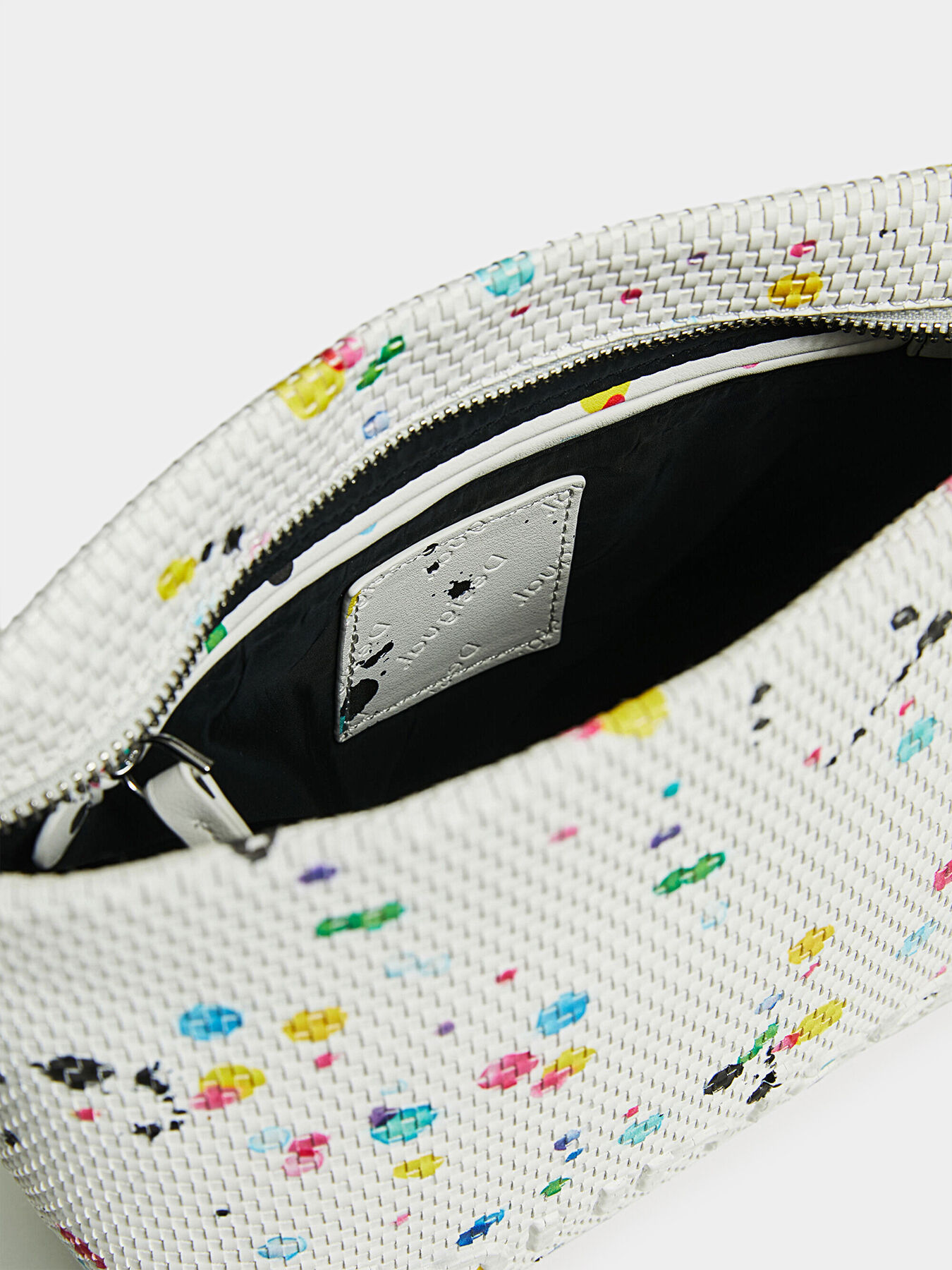 Crossbody bag with colorful paint splatter brand DESIGUAL