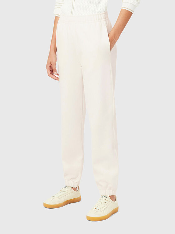 Sports trousers with zip at the legs - 1