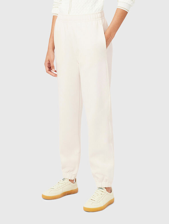 Sports trousers with zip at the legs - 1