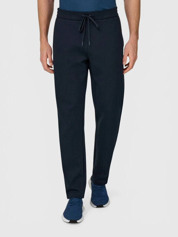 Trousers with pockets and logo detail - 1