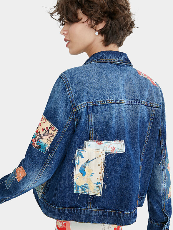 Denim jacket with floral motifs - 6