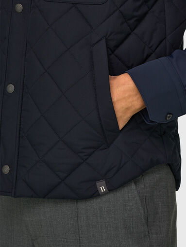 Padded vest with pocket - 5