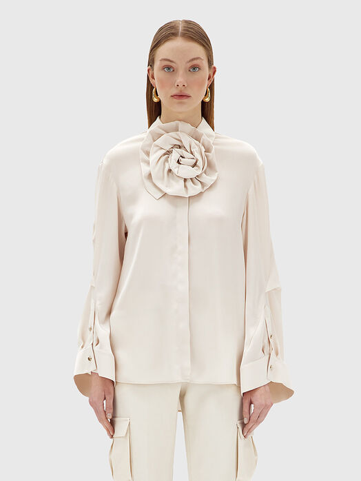 Shirt with accent flower