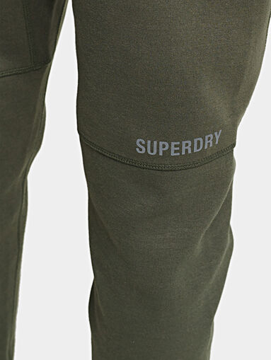 Black sports pants with logo details - 4
