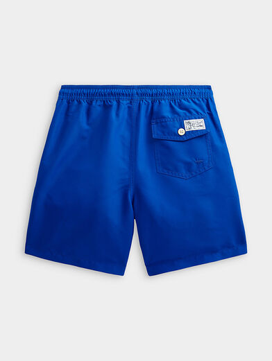 Blue swim trunks with logo accent - 2