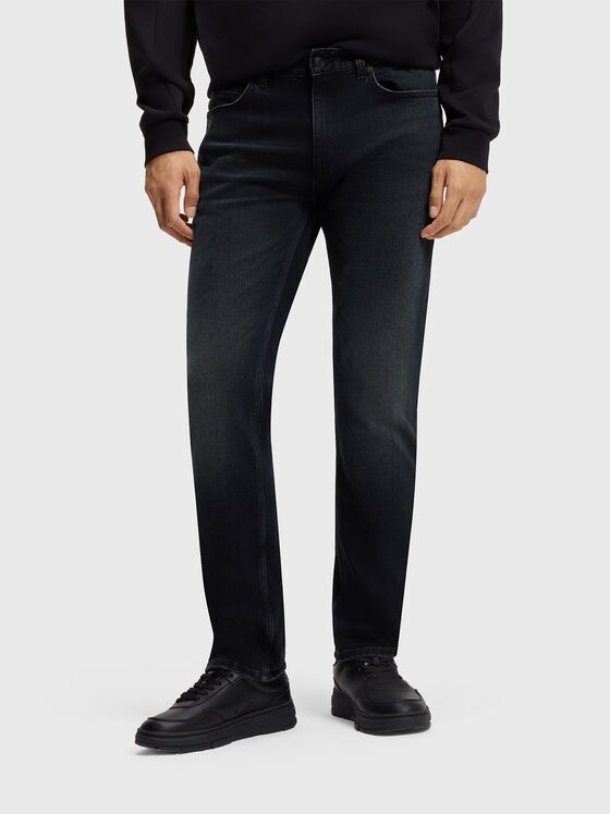 Jeans with worn effect and logo - 1