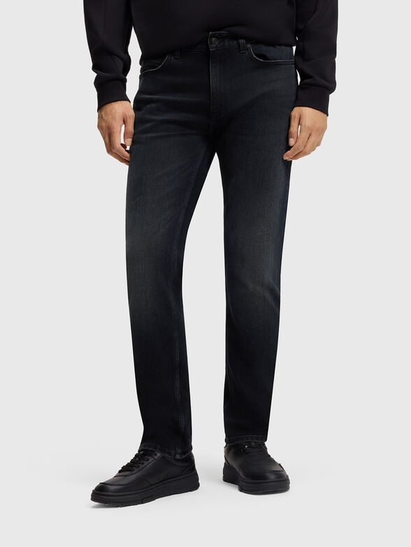 Jeans with worn effect and logo - 1