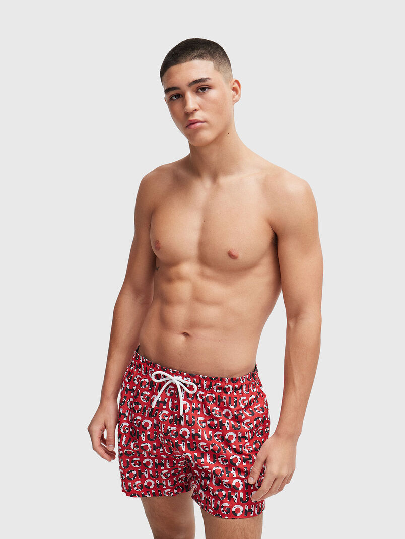 TORTUGA beach shorts with a monogram print - 3