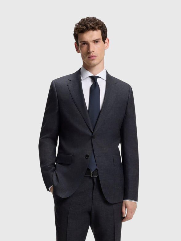 A suit made of a wool and silk blend - 3