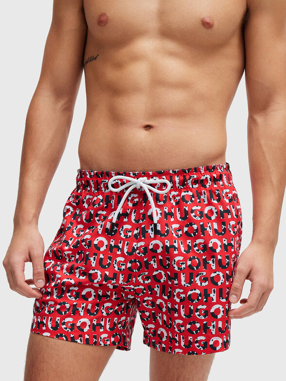 TORTUGA beach shorts with a monogram print - 1