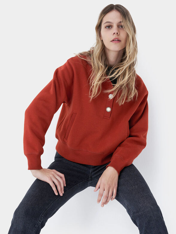 Hooded sweatshirt and accent buttons - 6