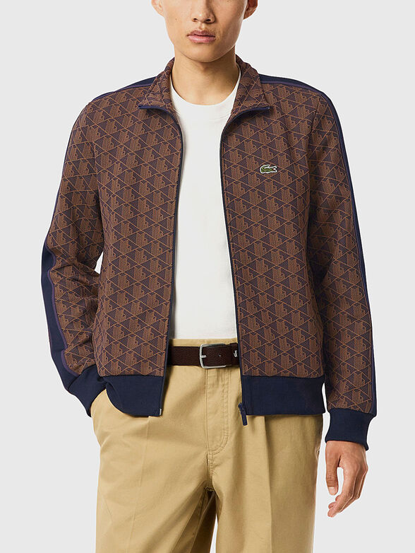 Sweatshirt with monogram print in brown - 1