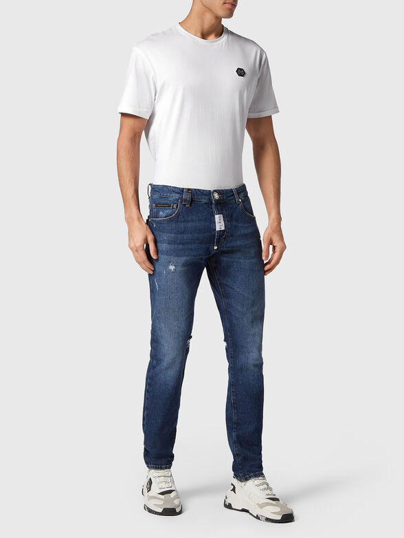 Blue jeans with rips - 3