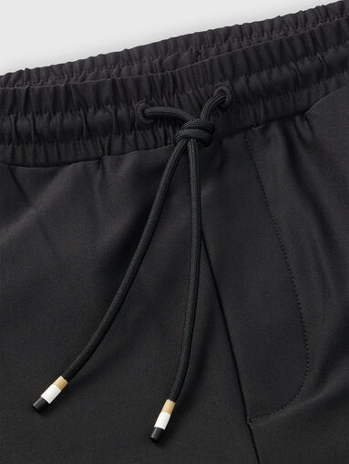 Pants with side stripes - 4