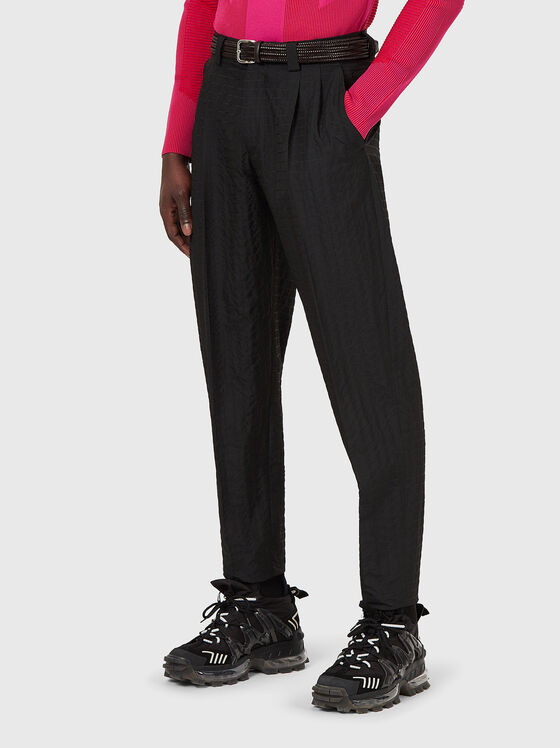 Trousers with cuffs and pockets - 1