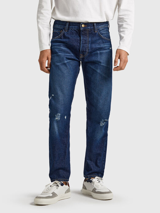 Dark blue jeans with logo patch