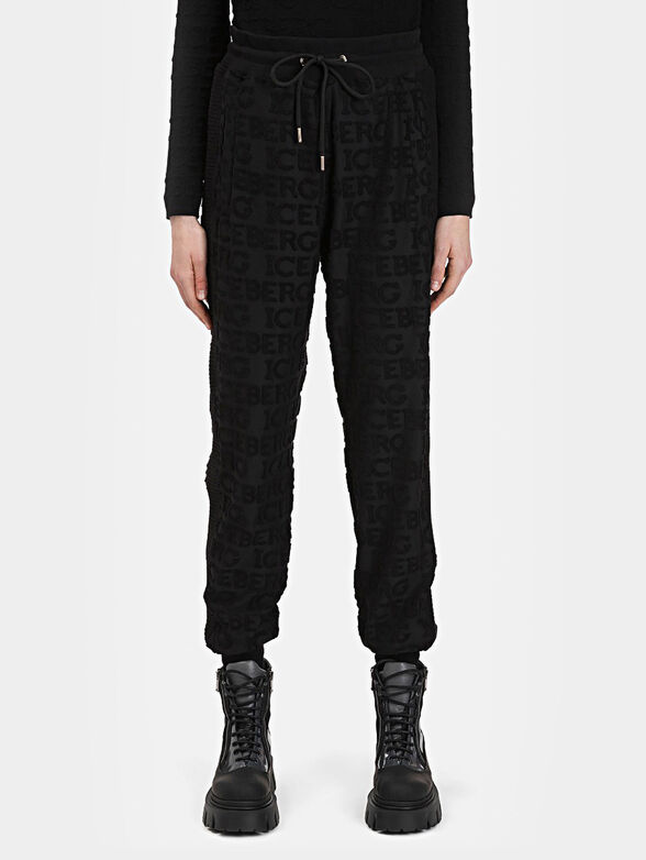 Black sports pants with logo datails - 1