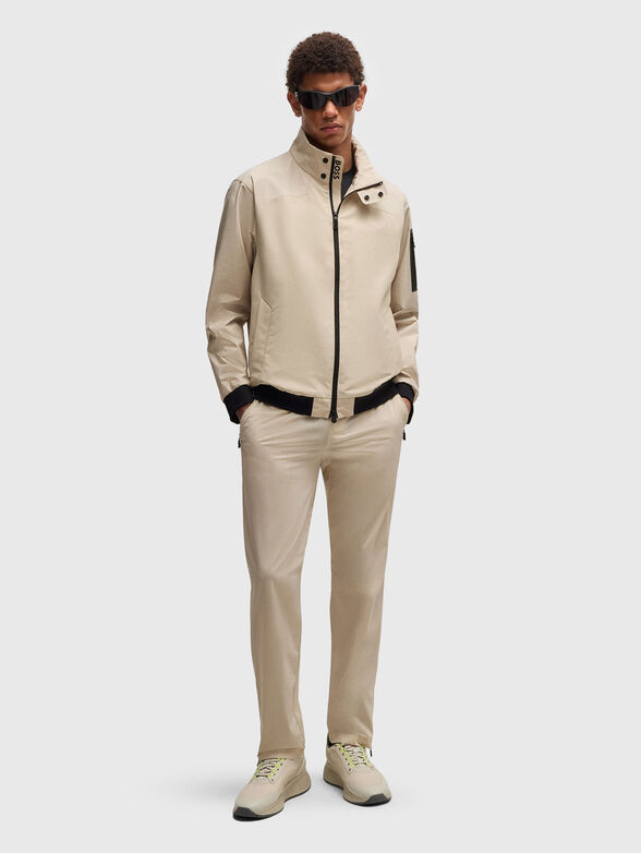 Sport trousers with an accent zip and logo - 4