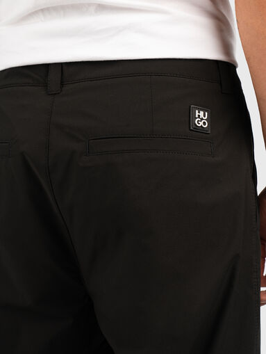 Straight trousers with cuffs - 3