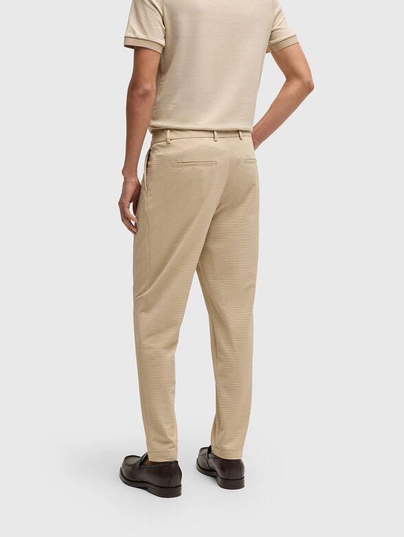 Textured trousers in beige - 2