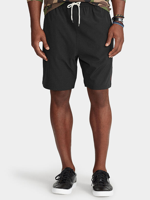 Black swim trunks - 1