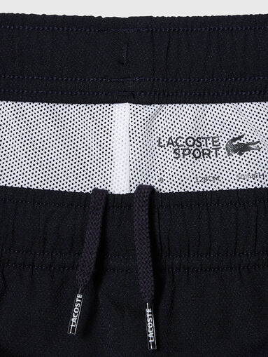 Dark blue sports trousers - 4