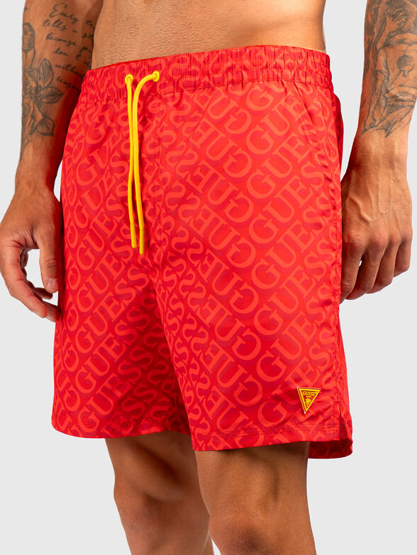 Beach shorts with logo print in grey - 1