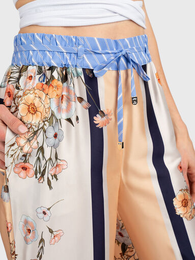 Floral print trousers - 4