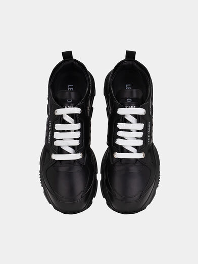 Black sports shoes with accent sole - 6