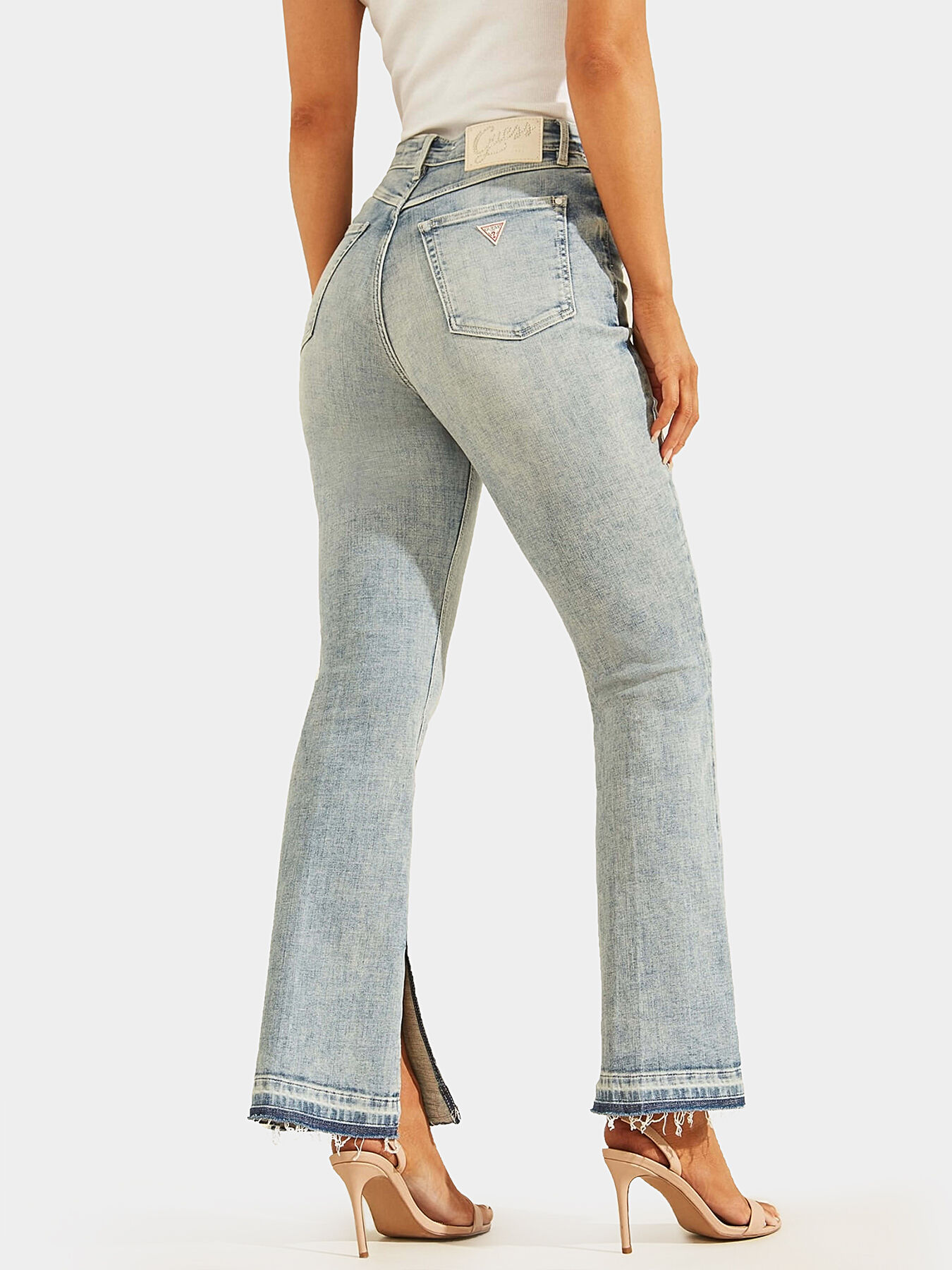 POP 70S jeans with washed effect brand GUESS — Globalbrandsstore