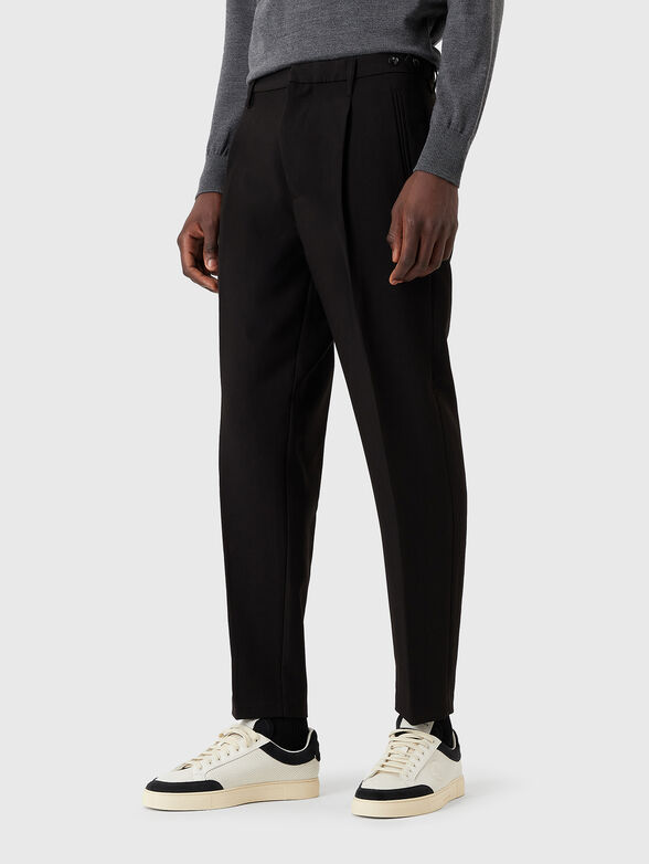 Slim trousers with cuffs and logo detail - 1