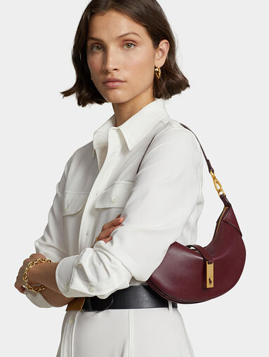 Leather bag in bordeaux color and metal accents - 5