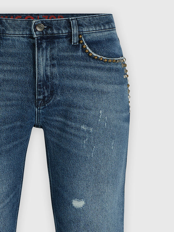 Blue jeans with eyelets - 1