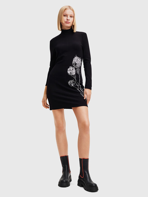 Black dress with floral accent - 1