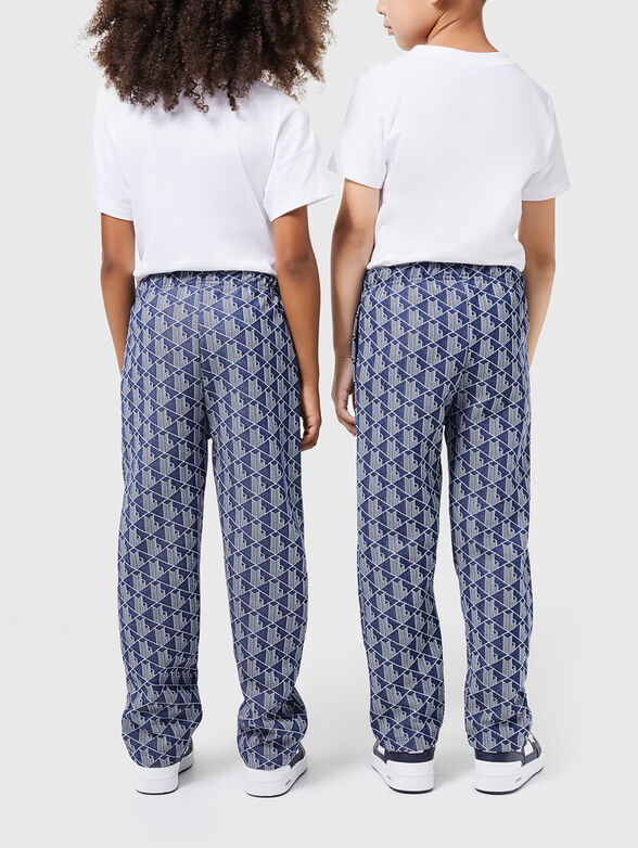 Black sports trousers with geometric pattern - 2