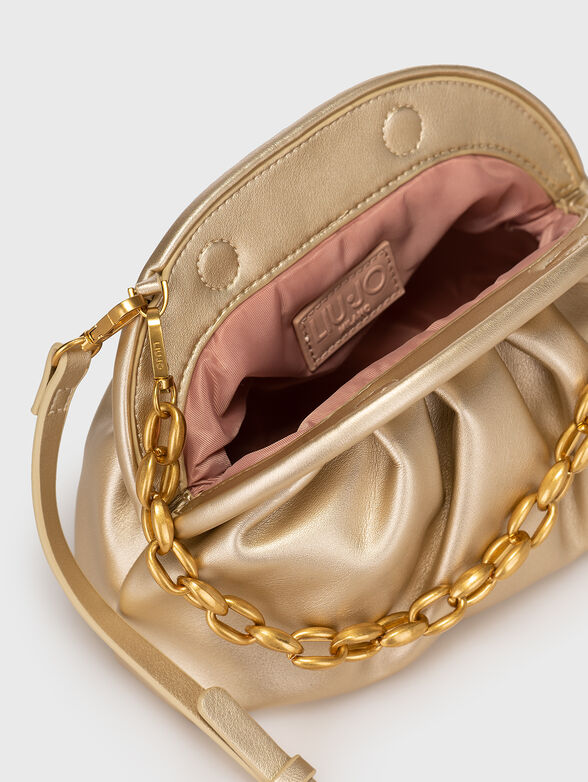 Black handbag with golden details - 6