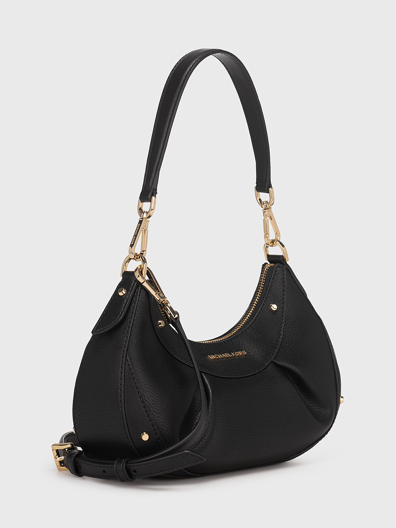 Black bag with eyelets and metal logo brand MICHAEL KORS