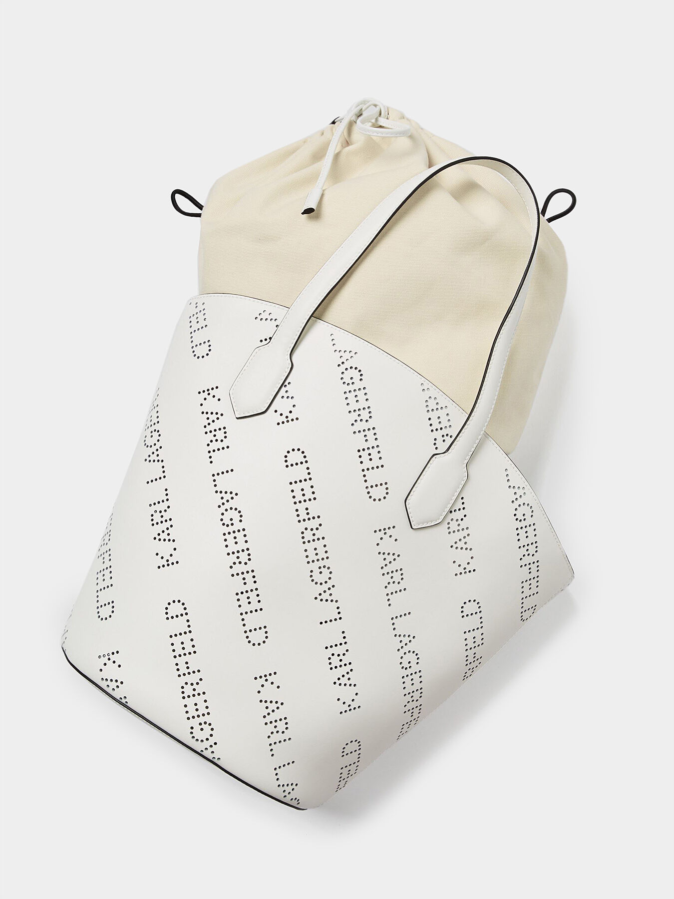 KARL LAGERFELD Kスケア ハフォレテット トトハック 【関税込】 Women's K/CIRCLE PERFORATED SADDLE BAG by KARL LAGERFELD
